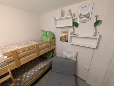 Ein Bett oder Betten in einem Zimmer der Unterkunft Bocksbergbande