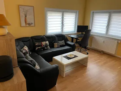 Ein Sitzbereich in der Unterkunft Bodetalapartment Thale