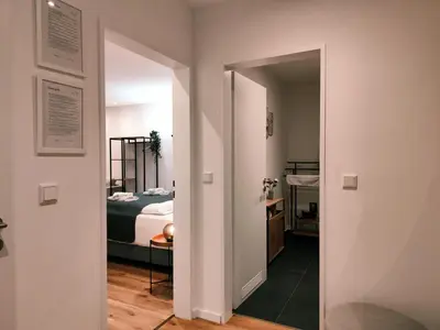 Ein Bett oder Betten in einem Zimmer der Unterkunft ApartZ - Bad Harzburg - HarzPause - Infrarotsauna - Parkplatz - Balkon - Regendusche