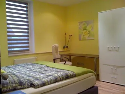 Ein Bett oder Betten in einem Zimmer der Unterkunft XXL City-Appartement Wernigerode
