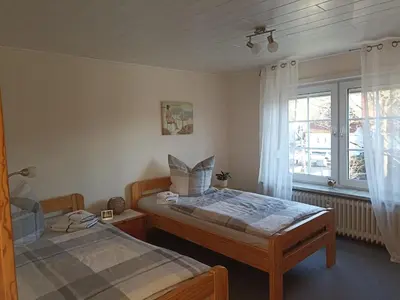 Ein Bett oder Betten in einem Zimmer der Unterkunft Ferienwohnung nahe Goslar und am Harzrand