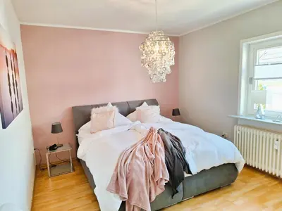 Ein Bett oder Betten in einem Zimmer der Unterkunft Chalet an der Bode - Schicke 3 Zi Fewo mit Balkon