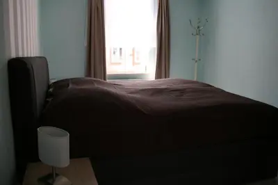 Ein Bett oder Betten in einem Zimmer der Unterkunft Apartments Altstadtoase