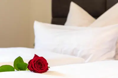Ein Bett oder Betten in einem Zimmer der Unterkunft Hubertus Hof