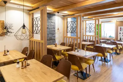Ein Restaurant oder anderes Speiselokal in der Unterkunft Hubertus Hof