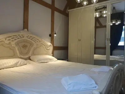 Ein Bett oder Betten in einem Zimmer der Unterkunft Hotel & Hostel Drei Bären