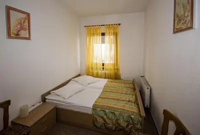 Ein Bett oder Betten in einem Zimmer der Unterkunft Hotel & Hostel Drei Bären