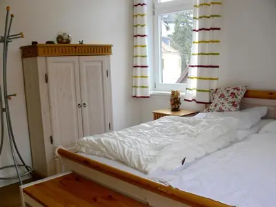 Ein Bett oder Betten in einem Zimmer der Unterkunft Ferienwohnung Siegers