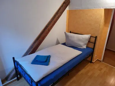 Ein Bett oder Betten in einem Zimmer der Unterkunft Ferienhaus Wernigerode 