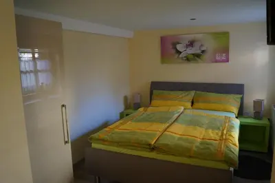 Ein Bett oder Betten in einem Zimmer der Unterkunft FeWo Carmen