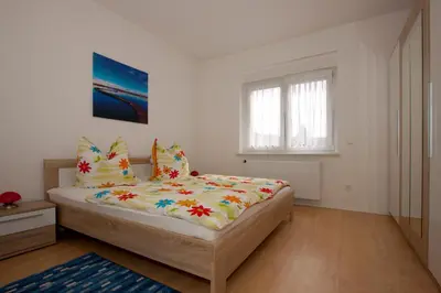 Ein Bett oder Betten in einem Zimmer der Unterkunft Roßtrappensicht