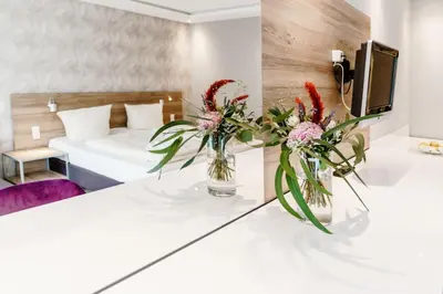 Ein Bett oder Betten in einem Zimmer der Unterkunft Appartements Am Kranichsee
