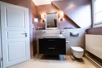 Ein Badezimmer in der Unterkunft country-suites by verdino LIVING - Apartments & Privatzimmer