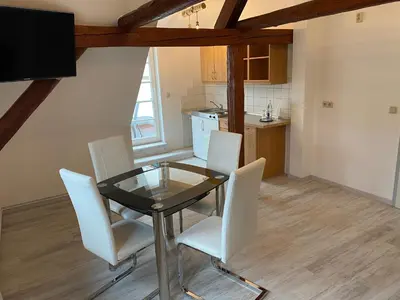 Küche/Küchenzeile in der Unterkunft Hotel Garni und Gaststätte Zum Holzfäller