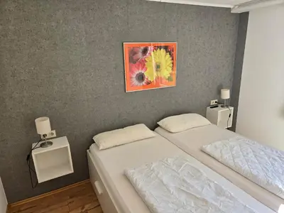 Ein Bett oder Betten in einem Zimmer der Unterkunft Ferienwohnung Ortlieb