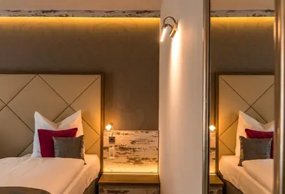 Ein Bett oder Betten in einem Zimmer der Unterkunft Hotel Allegro