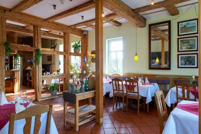 Ein Restaurant oder anderes Speiselokal in der Unterkunft Hotel Zum Harzer