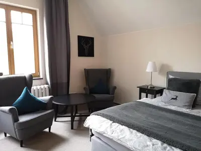 Ein Bett oder Betten in einem Zimmer der Unterkunft Comfort-Hotel garni Schierker Waldperle - inklusive Wellness