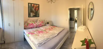 Ein Bett oder Betten in einem Zimmer der Unterkunft Erboys Ferienwohnung