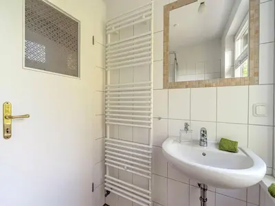 Ein Badezimmer in der Unterkunft Helle Wohnung mit Terrasse und Sauna