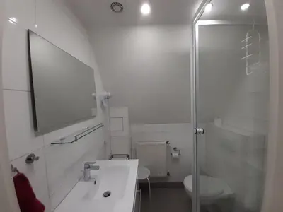 Ein Badezimmer in der Unterkunft Ferienwohnung Stricker B, Balkon 1/2