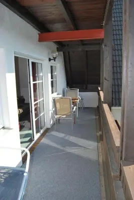 Ein Sitzbereich in der Unterkunft Ferienwohnung Stricker Typ B, Balkon 2/2