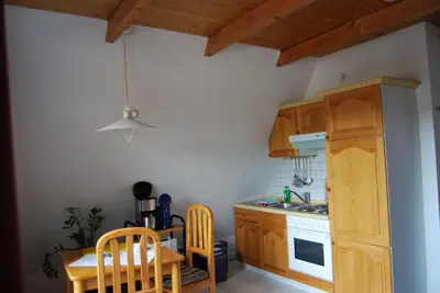 Küche/Küchenzeile in der Unterkunft Ferienwohnung Stricker Typ A, Balkon 1/3