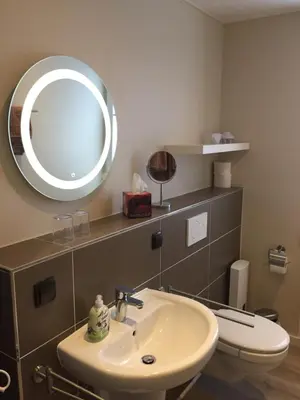 Ein Badezimmer in der Unterkunft Lina's Ferienwohnungen - zwei moderne FeWos mit Sauna im Haus und fantastischem Ausblick