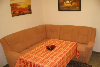 Ein Sitzbereich in der Unterkunft Ferienwohnung an der Brockenbahn