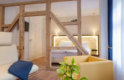 Ein Bett oder Betten in einem Zimmer der Unterkunft Sonnenresort Ettershaus