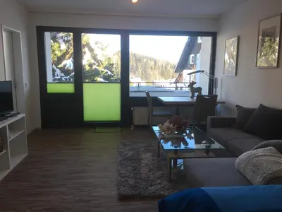 Ein Sitzbereich in der Unterkunft Ferienwohnung Harzmond