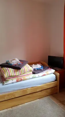 Ein Bett oder Betten in einem Zimmer der Unterkunft Hexenhaus am Waldesrand Wernigerode