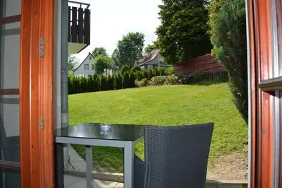 Ein Garten an der Unterkunft Hoffmann's Apartment in der Residenz Bocksbergblick