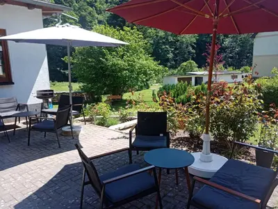 Ein Garten an der Unterkunft Pension Waldfrieden