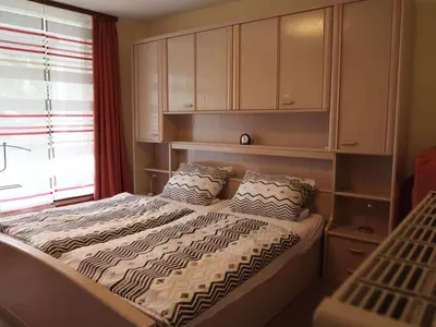 Ein Bett oder Betten in einem Zimmer der Unterkunft Ferienwohnung Harzburg