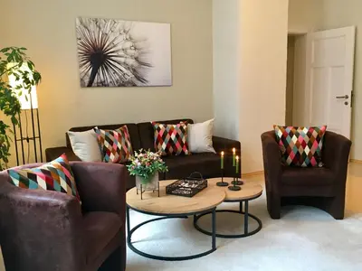 Ein Sitzbereich in der Unterkunft Schöne Ferienwohnung am Mathildenbrunnen