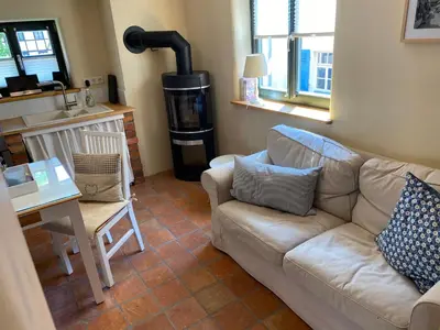 Ein Sitzbereich in der Unterkunft Ferienwohnung unterm Schreckensturm