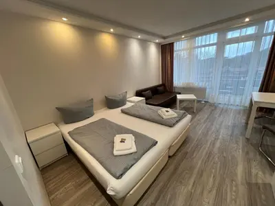 Ein Bett oder Betten in einem Zimmer der Unterkunft Haus Vier Jahreszeiten am See HS 582