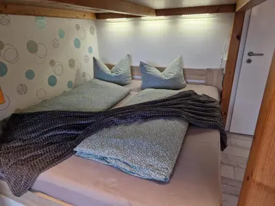 Ein Bett oder Betten in einem Zimmer der Unterkunft Nelson