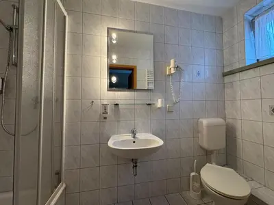Ein Badezimmer in der Unterkunft Hotel Zum Kanzler