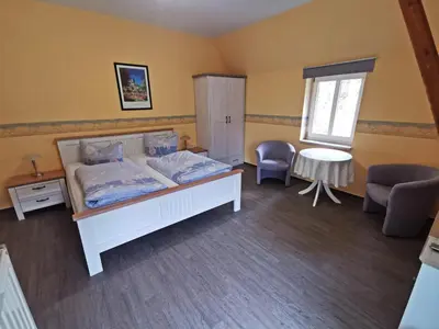 Ein Sitzbereich in der Unterkunft Pension Ginko