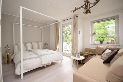 Ein Bett oder Betten in einem Zimmer der Unterkunft Ferienwohnung Zweisamkeit