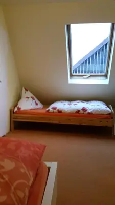 Ein Bett oder Betten in einem Zimmer der Unterkunft Haus Isabelle OG
