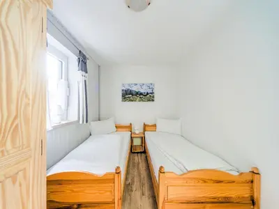 Ein Bett oder Betten in einem Zimmer der Unterkunft Gemütliche Ferienwohnung bei Braunlage