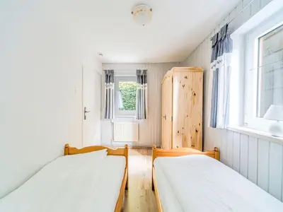 Ein Bett oder Betten in einem Zimmer der Unterkunft Gemütliche Ferienwohnung bei Braunlage