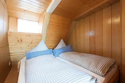 Ein Bett oder Betten in einem Zimmer der Unterkunft Das Ferienhaus