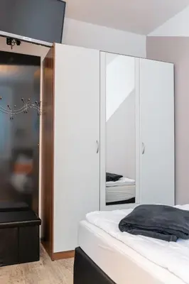 Ein Bett oder Betten in einem Zimmer der Unterkunft Hahnenklee Ferienpark 409 & 211