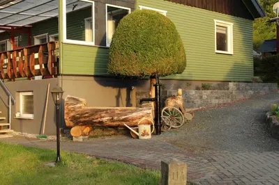 Ein Garten an der Unterkunft Ferienhäuser 