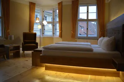 Ein Bett oder Betten in einem Zimmer der Unterkunft Kunsthaus mit Frühstück im Hotel Theophano