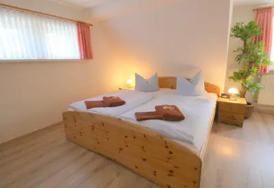Ein Bett oder Betten in einem Zimmer der Unterkunft Hotel Brockenstübchen